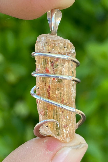 Imperial Topaz Crystal in Sterling Silver Tension Wrapped Pendant