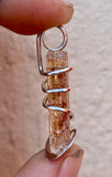 Imperial Topaz Crystal in Sterling Silver Tension Wrapped Pendant
