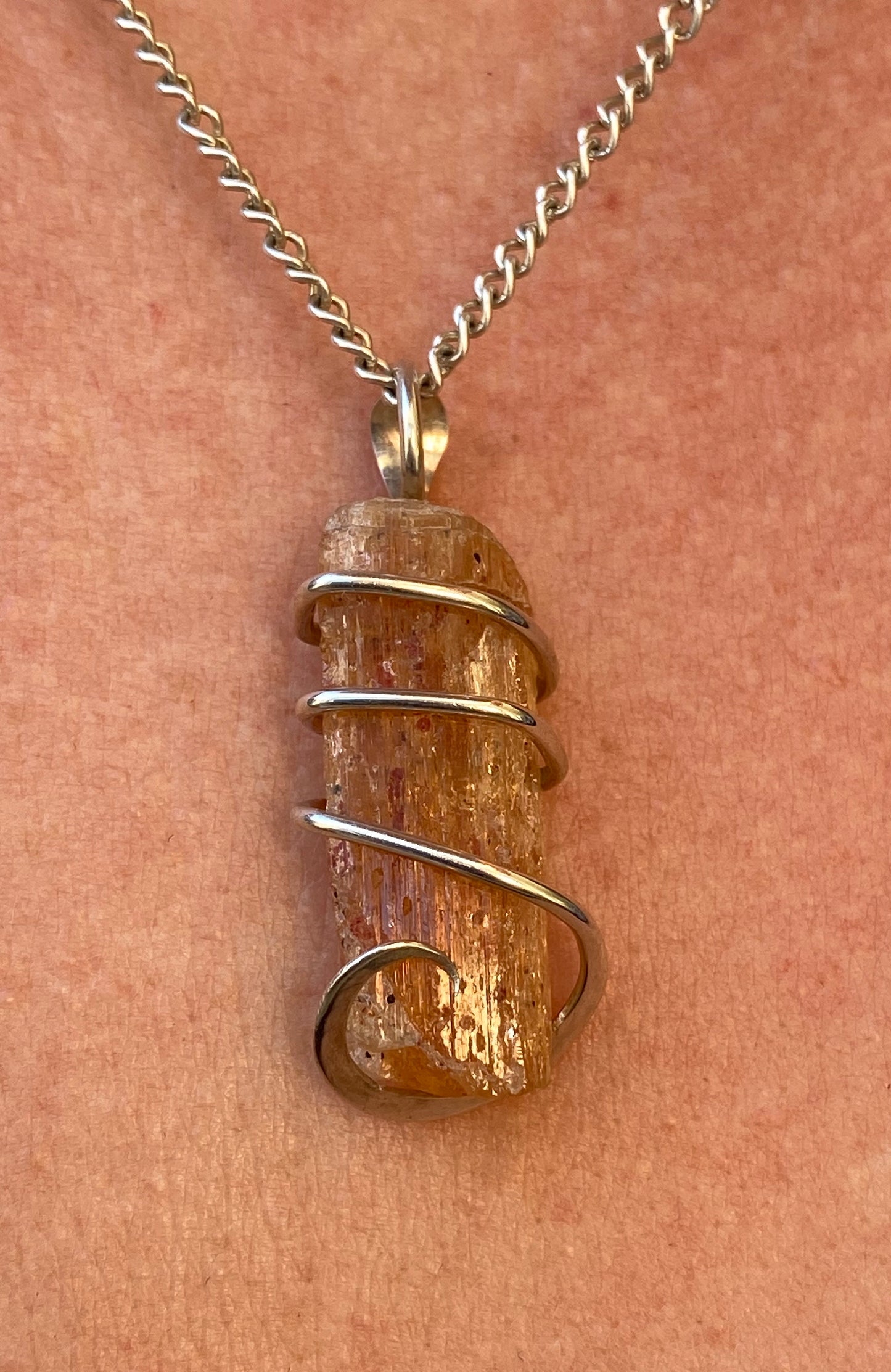 Imperial Topaz Crystal in Sterling Silver Tension Wrapped Pendant