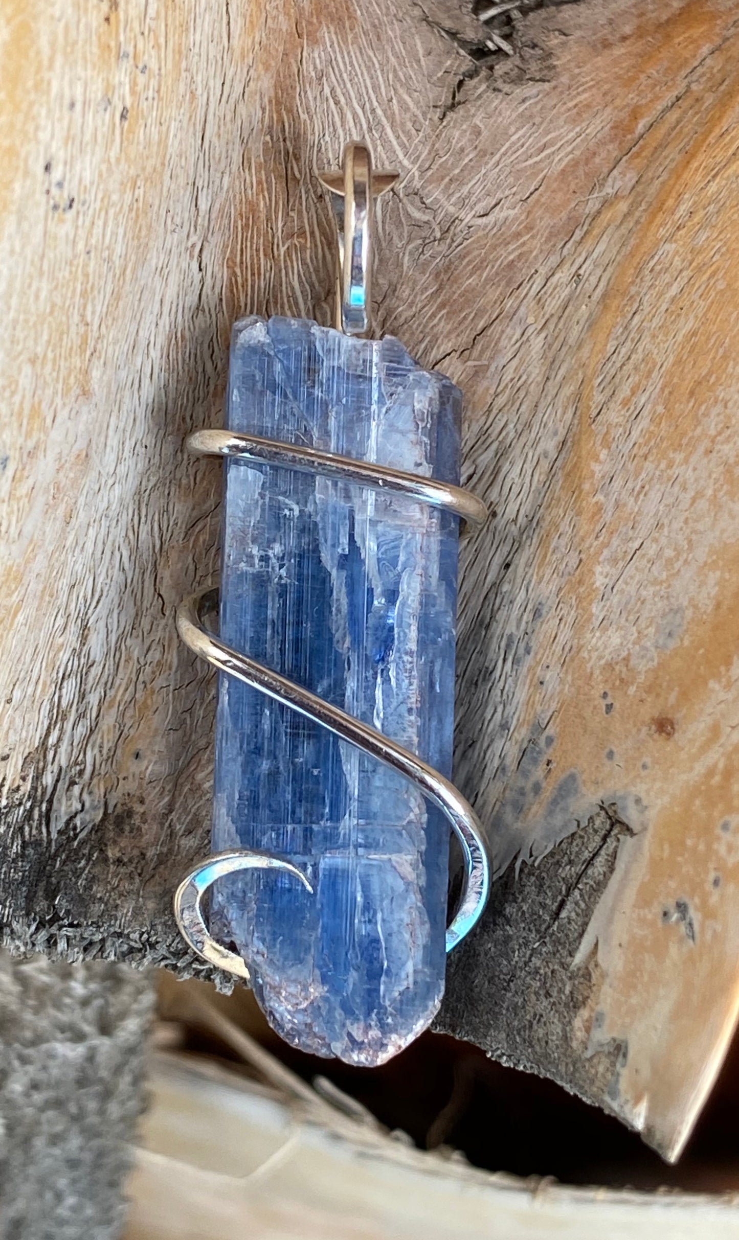 Blue Kyanite Crystal in Sterling Silver Tension Wrapped Pendant