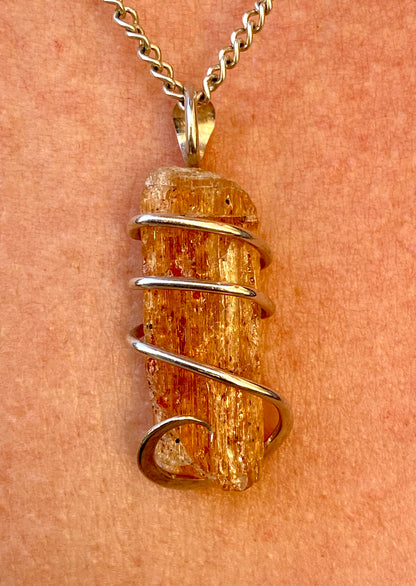 Imperial Topaz Crystal in Sterling Silver Tension Wrapped Pendant