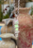 Platinum Infused Quartz Crystal in Sterling Silver Tension Wrapped Pendant