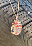 Fordite in Sterling Silver Tension Wrapped Pendant