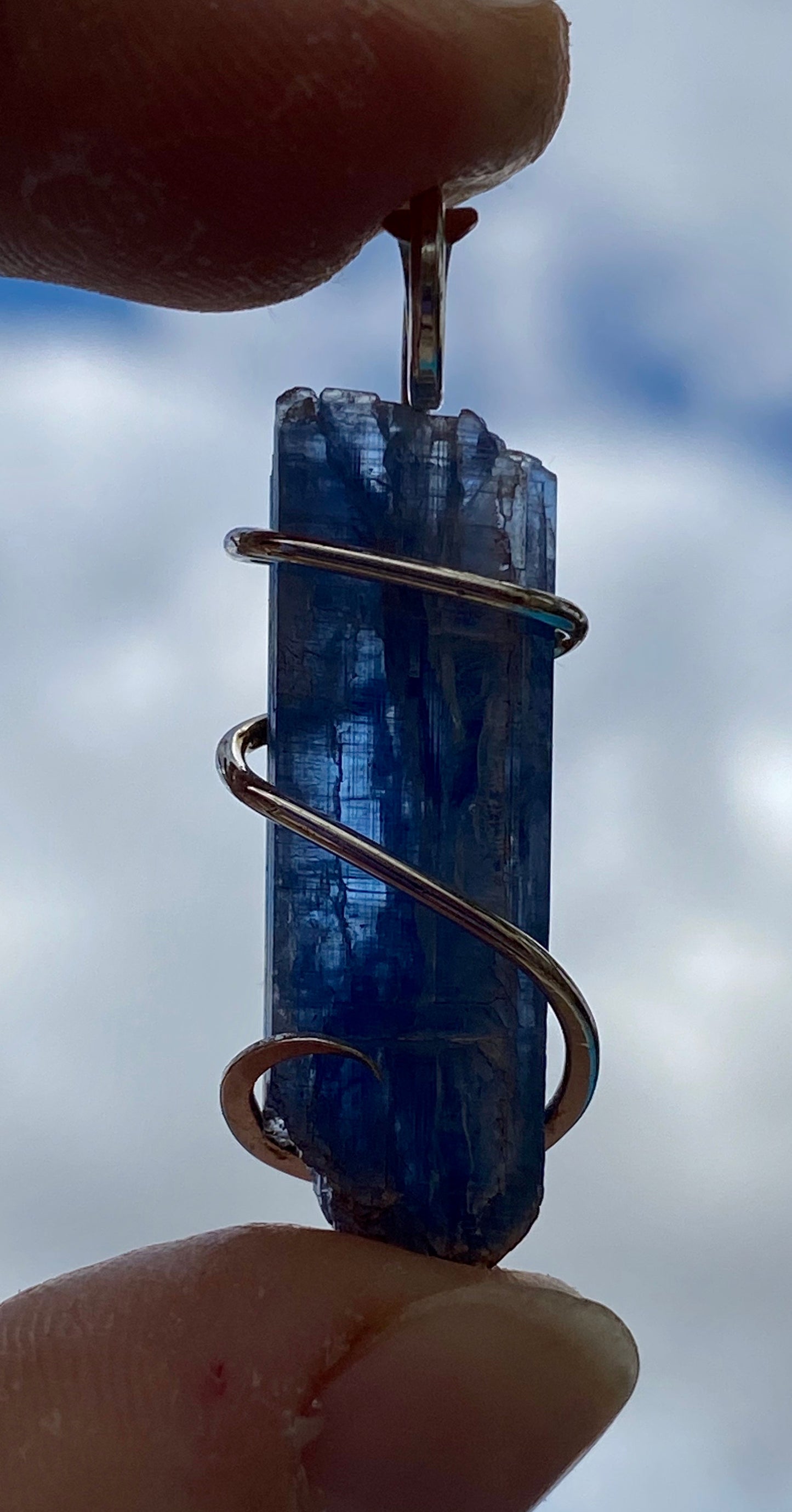 Blue Kyanite Crystal in Sterling Silver Tension Wrapped Pendant