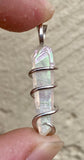 Platinum Infused Quartz Crystal in Sterling Silver Tension Wrapped Pendant