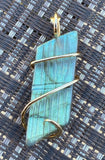Carved Labradorite Cabochon in 14kt Gold Tension Wrapped Pendant